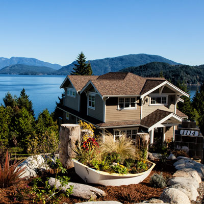 Image for Real Estate Lawyers Vancouver Island, large house with ocean view